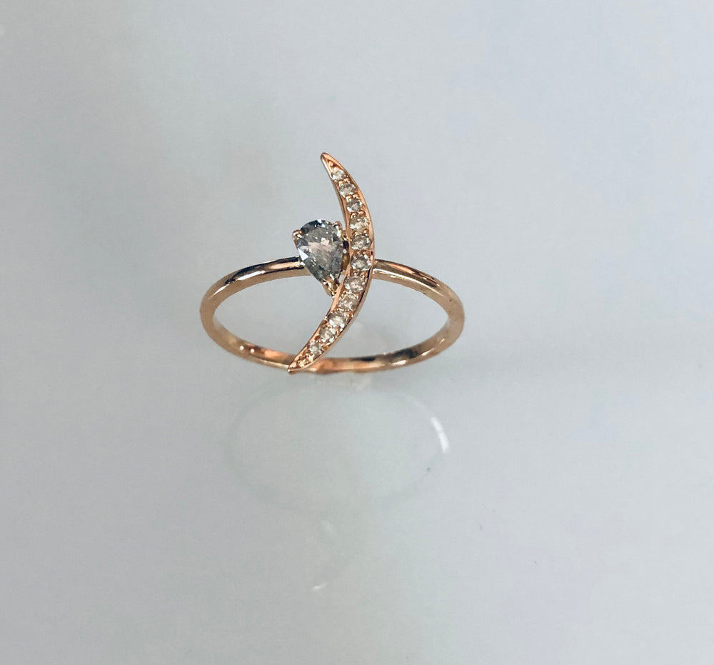 Moon and pear cut diamond ring