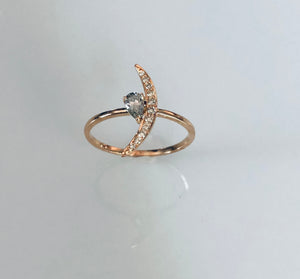 Moon and pear cut diamond ring