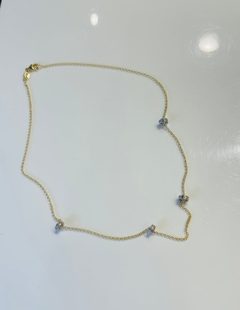 Yellow gold chain with white gold randels