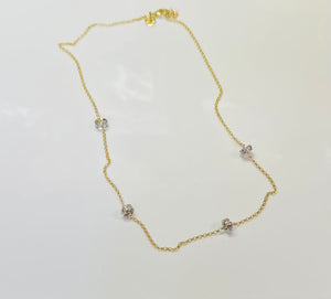 Yellow gold chain with white gold randels